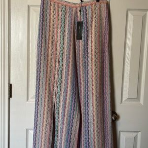 High waist palazzo pants w/back zip,has slits at thighs for skirt look